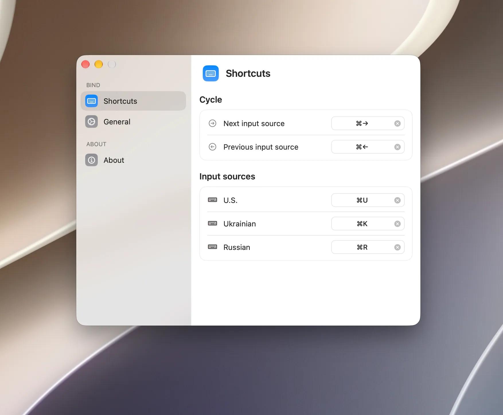 Bind Settings Shortcuts tab with Next and Previous cycle bindings and per-source shortcuts